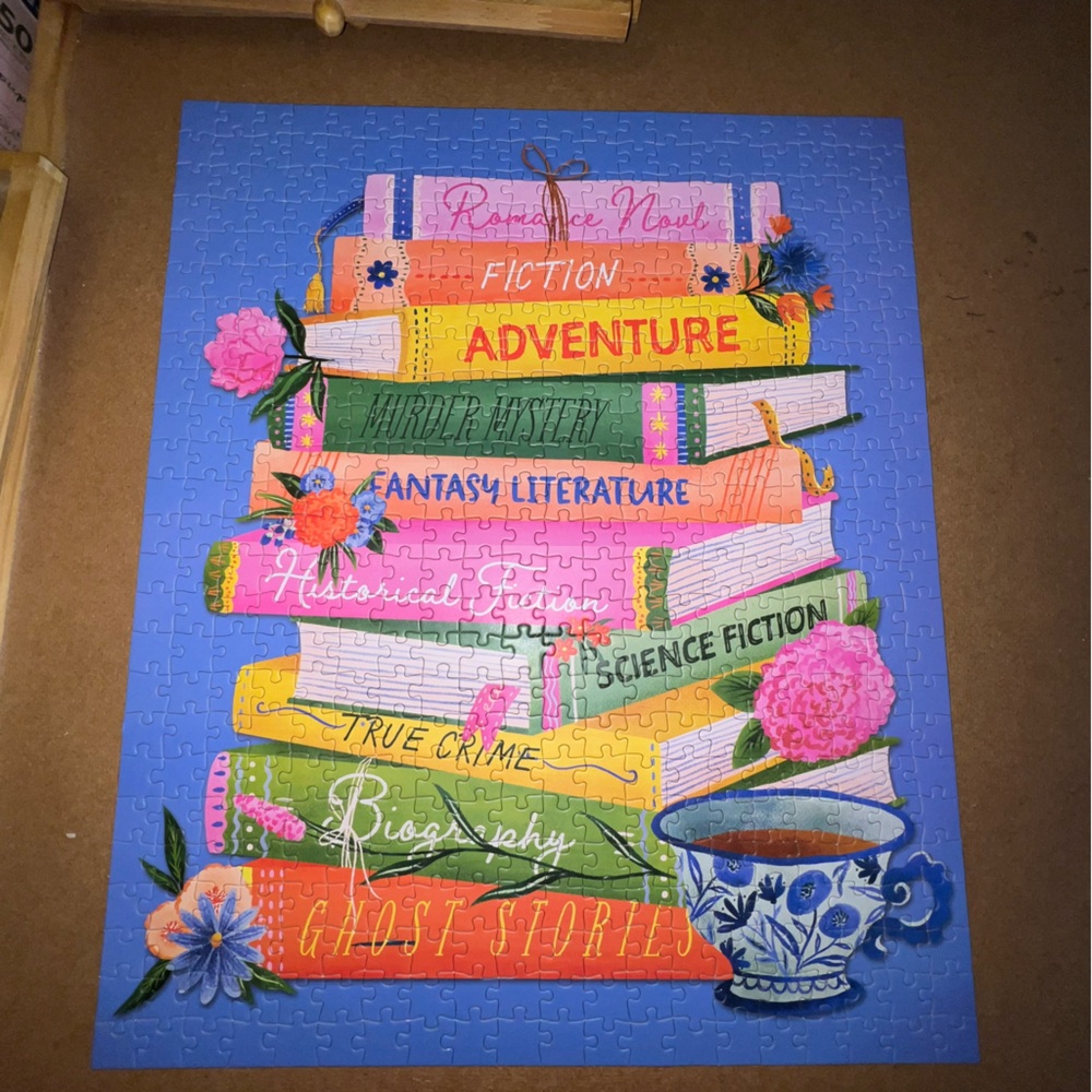 Colorful Book Stack Jigsaw Puzzle - Blue Background